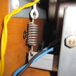 Hammond tonewheel generator spring attachment